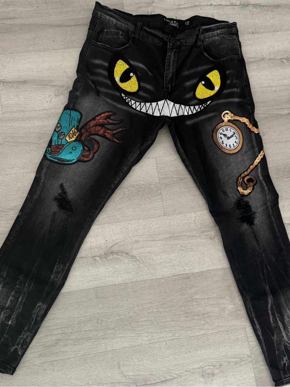 Black Men's Graphic Slim Jeans with Embroidered Art